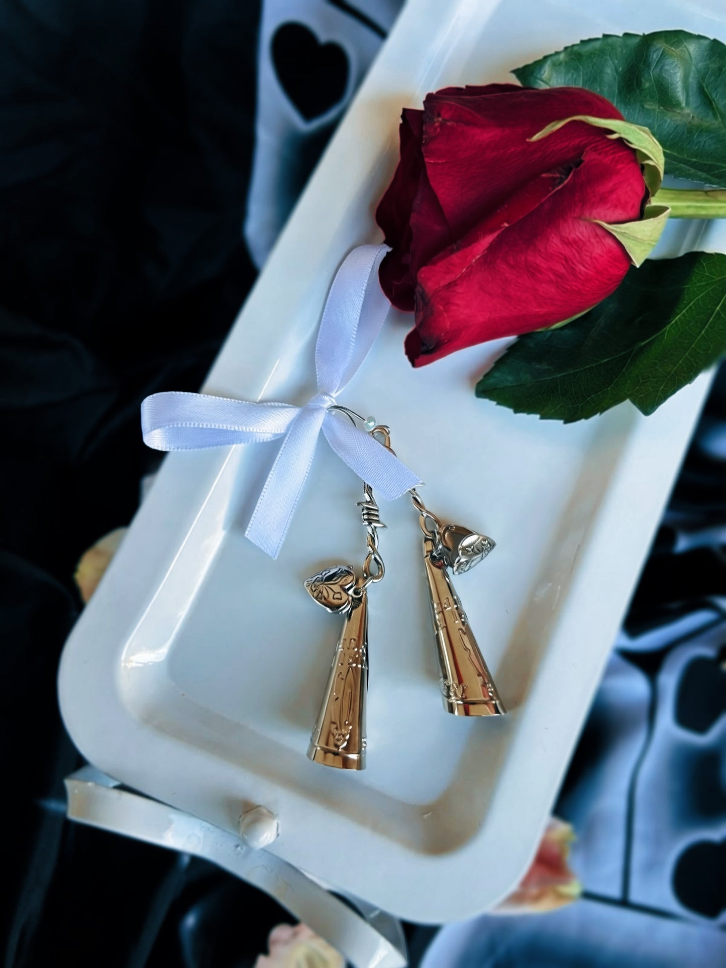 Barbed wire jingle earrings with heart lockets