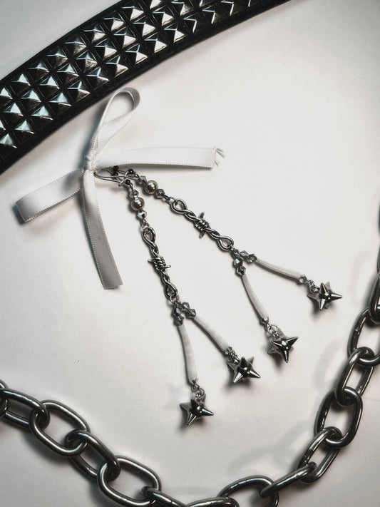 When It Wasn’t Just a Phase 
Barbed Wire Dentalium Flail Charm Earrings